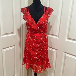 Woman’s, L, red, floral dress. Inside liner. Made by “by & by”. NWT.